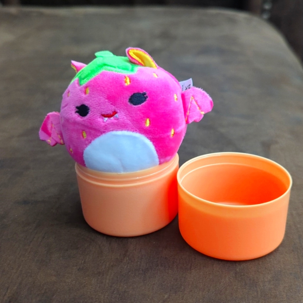 Blacklight strawberry bat squishmallow